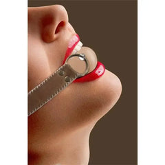 Woman using ball gag from SecretSexToys' 🤐MOUTH GAGS collection, enhancing BDSM experience and connection with partner.