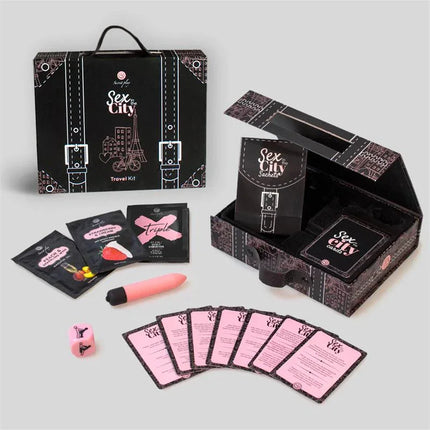 Travel Kit Sex in the City set with cards, accessories, and packaging for romantic getaway.