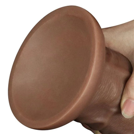 Close-up of the Dildo King 10.5 with Vibration Chubby Brown base, showcasing lifelike texture and suction feature for diverse use.