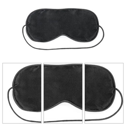 Black blindfold from Bondage Kit Deluxe with Vibrator Black for intimate exploration and sensation play.
