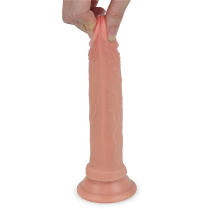 Dildo Nature 7 Liquid Silicone Flesh in hand showcasing its lifelike texture and dual-density material for realistic pleasure.
