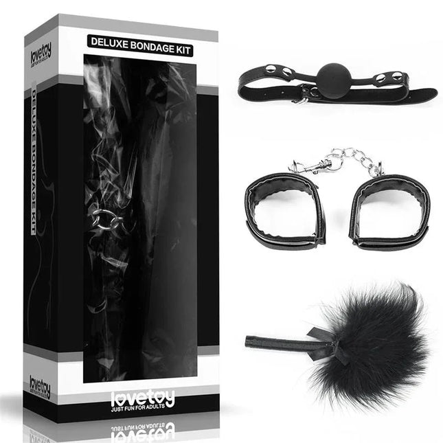 Bondage Kit Deluxe Black featuring gag, handcuffs, and tickler in a sleek box for playful exploration.