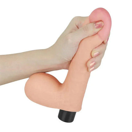 Person holding Vibe Real Softee 8 Flesh vibrator with realistic, lifelike appearance.