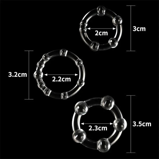Pack of 3 Penis Ring Power Plus Triple Clear with sizes 3 cm, 3.2 cm, and 3.5 cm shown on black background