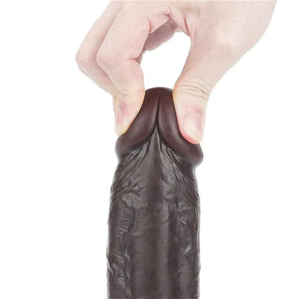 Dildo Sliding 9 Black held by hand showcasing realistic texture and flexibility