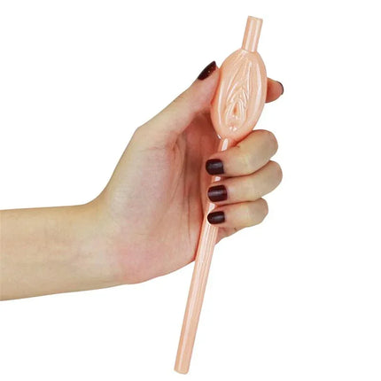 Hand holding a Pussy Straws Pack of 9 novelty vagina-shaped straw, ideal for bachelorette or themed parties.