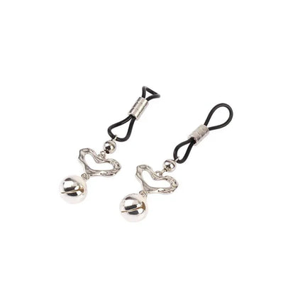 Señuelo Heart Echo Nipple Clamps with heart shape and bell cue, zinc alloy and silicone components.
