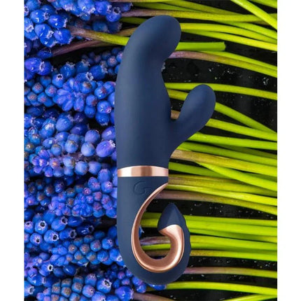 Gentley G-spot Vibe Caribbean Blue with unique G-shaped design on floral background