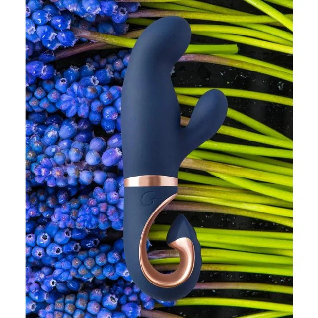 Gentley G-spot Vibe Caribbean Blue with unique G-shaped design on floral background