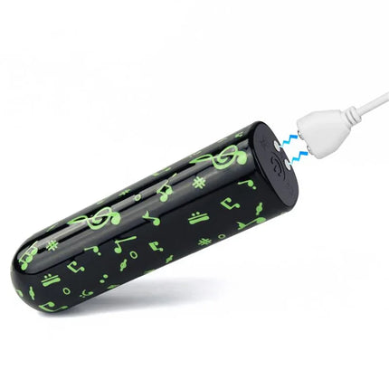 Vibrating Bullet Glow-in-the-dark with musical notes pattern and USB charger, compact and travel-friendly