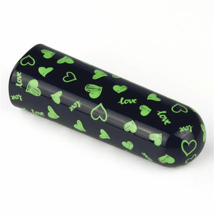 Vibrating Bullet Glow-in-the-dark with heart design, compact and USB-rechargeable, ideal for discreet pleasure and travel use.