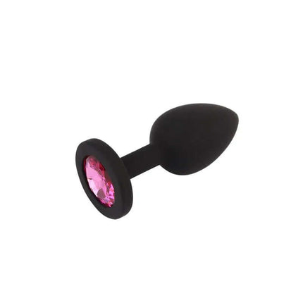 Jewel Butt Plug with Gem featuring a red acrylic jewel and silicone body for enhanced pleasure and style.