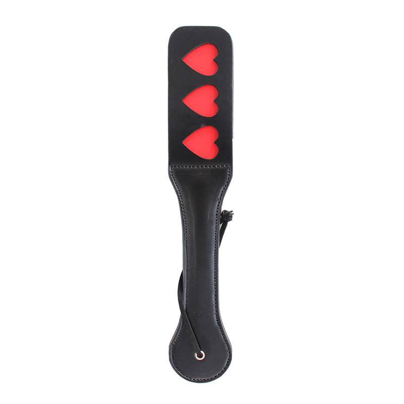 Black vegan leather paddle 32 cm with three red heart cutouts down the center and wrist strap.