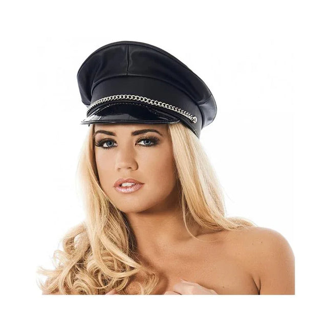Police Cap with metal chain in black imitation leather for adult role-play and BDSM, worn by model. Available in sizes S/M and M/L.