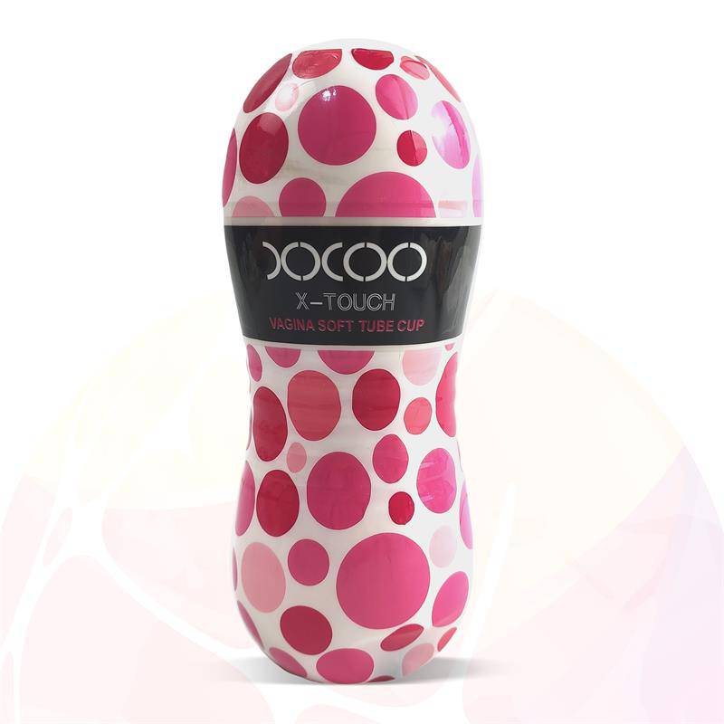 White and pink polka dot soft silicone vibrating male masturbator cup with black XOXO band.