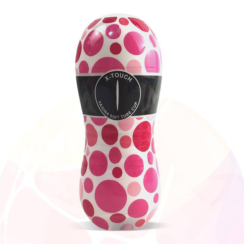 Pink and white polka dot handheld vibrator with black central control band labeled X-Touch.