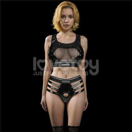 Woman wearing 2 Pieces Set Rebellion Reign Iconic Harness featuring black mesh and PU material against a black background.
