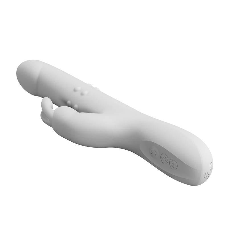 White silicone vibrator with rotating beads and clitoral stimulator, ergonomic design with button controls.