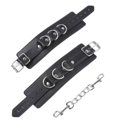3 D-Ring Handcuffs from Latetobed BDSM Line, black adjustable cuffs designed for versatile restraint and synchronized play.