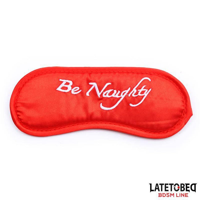 3 Pieces Bondage Set Cuffs, Eye Mask and Feathers - red eye mask with 'Be Naughty' embroidery for sensory play
