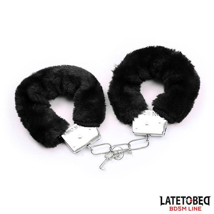 Black fluffy handcuffs from 3 Pieces Set Mask, Handcuffs and Feathers Black by Latetobed.
