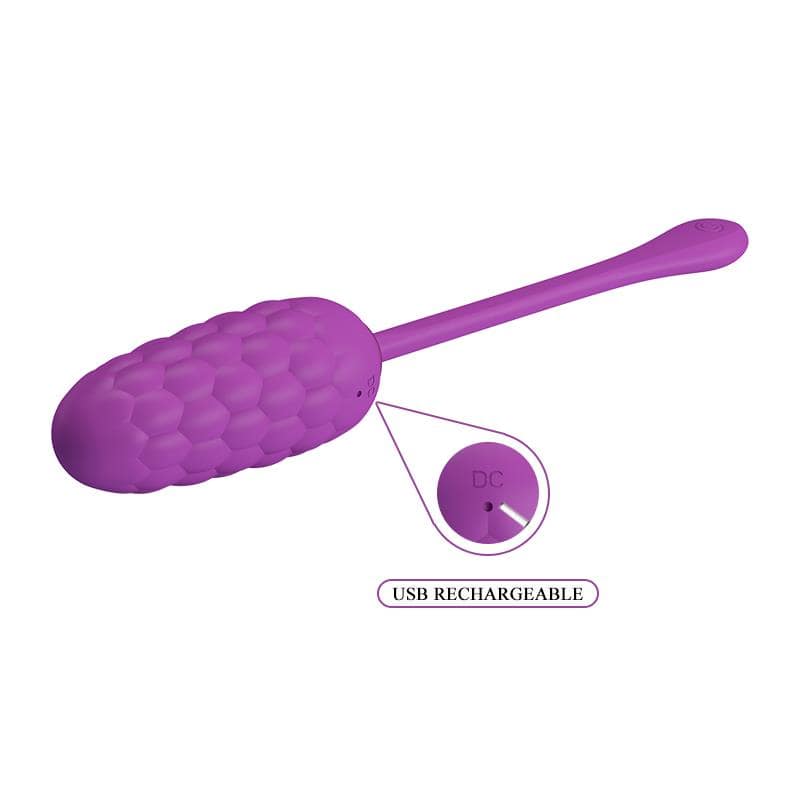 Purple textured silicone vibrating egg with elongated tail and USB charging port.