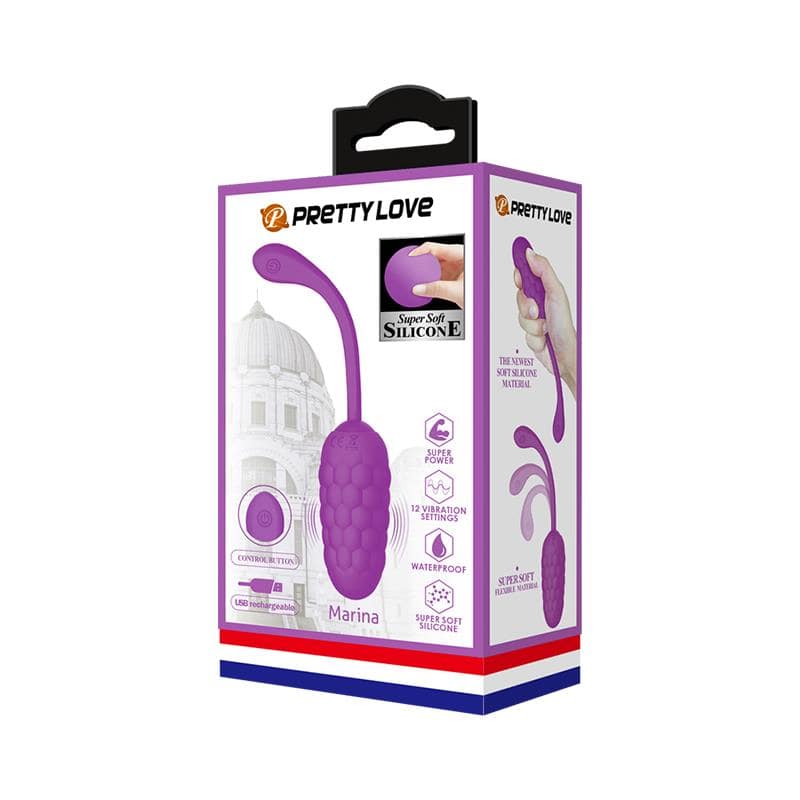 Purple textured silicone vibrating egg with USB charging cable in white and black packaging.