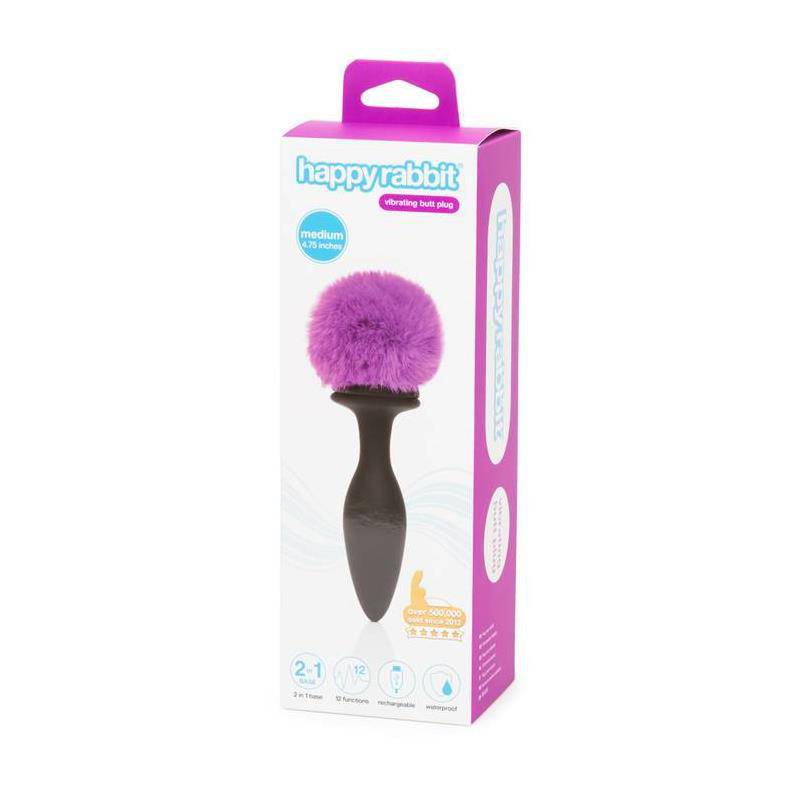 Purple anal plug with large fluffy pom-pom and double base in black silicone packaging.