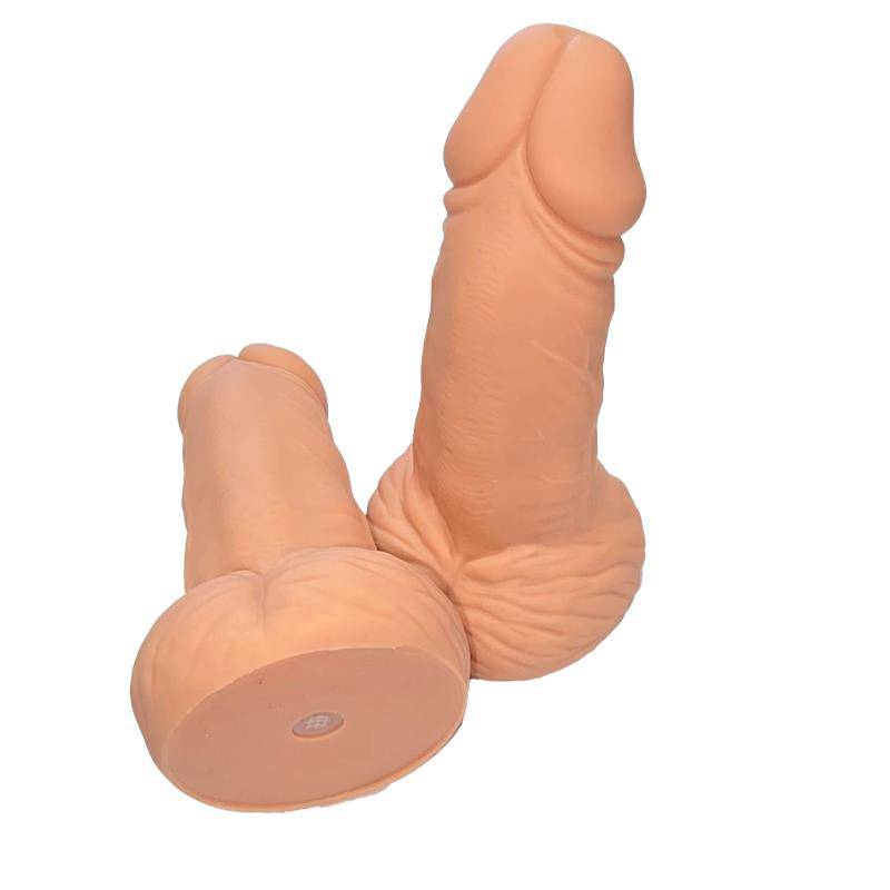 Penis shaped whistle with testicles