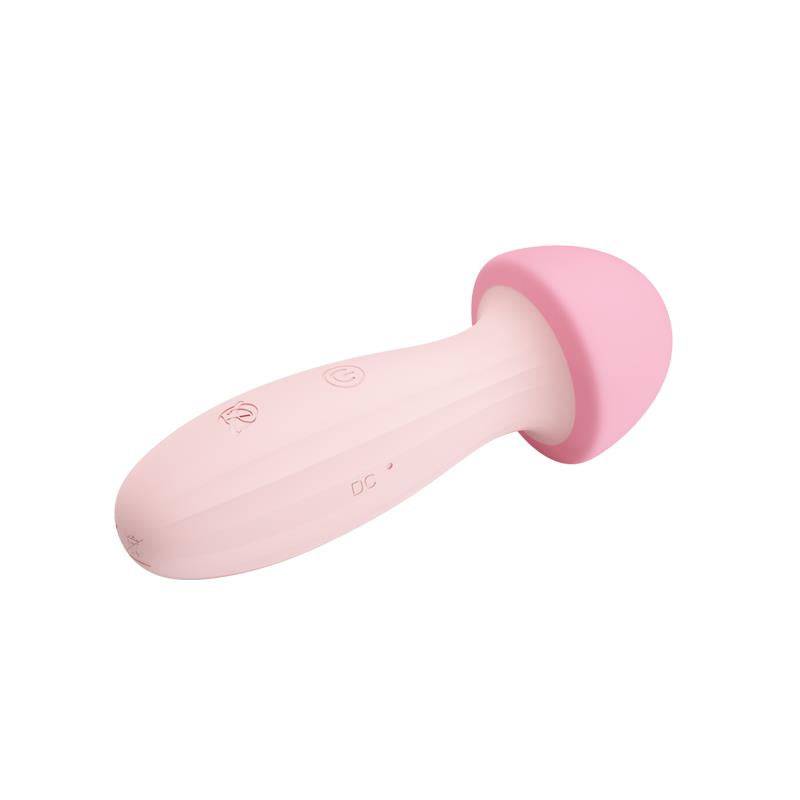 Pink silicone mushroom-shaped massager with smooth rounded cap and ergonomic handle.