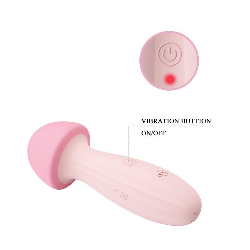 Pink silicone mushroom-shaped massager with ergonomic handle and vibration power button.