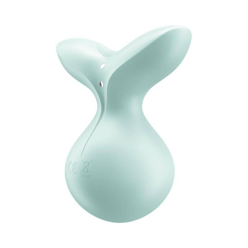 Mint green silicone stimulator with a curved, ergonomic design and smooth matte finish.