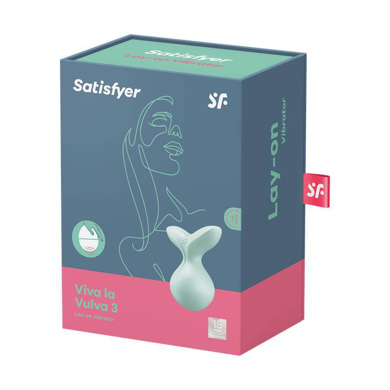 Mint green ergonomic stimulator with a smooth, curved design displayed on teal and pink packaging.