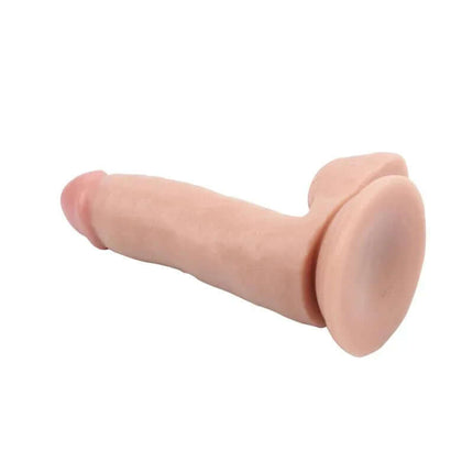 Dildo Dual Density Fashion Dude 6.7 Flesh with realistic texture and suction cup base in flesh color.