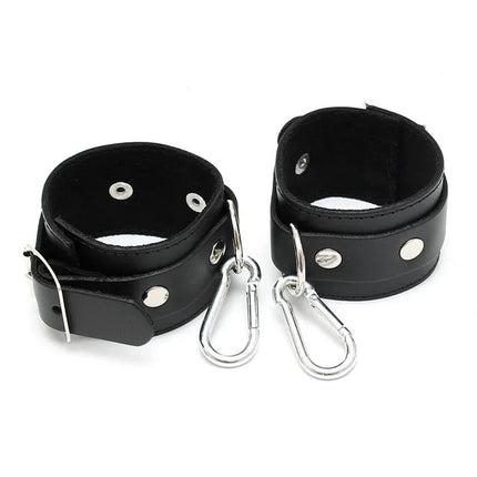 Cuffs Adjustable premium black leather bondage cuffs with an adjustable buckle system and sleek design for secure, comfortable fit.