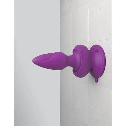 Wall Banger Butt Plug with Vibration featuring suction cup on wall for hands-free use