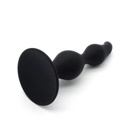Dylamic Butt Plug Silicone 11 cm x 3 cm by Afterdark, premium black silicone anal toy with curved tip for comfort.