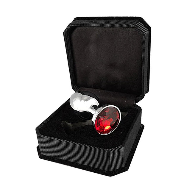 Plug with Cristal 5,7 cm luxury steel anal plug with red glass inset displayed in a black gift box