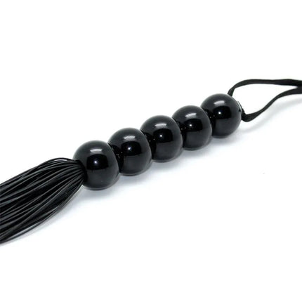 Black leather Flogger 38 cm with beads for BDSM sensation play and impact control