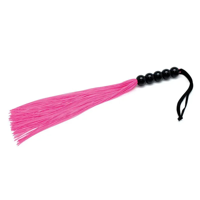 Flogger Silicone Pink 38 cm with black handle, ideal for tactile play and enthusiasts seeking durable silicone design.