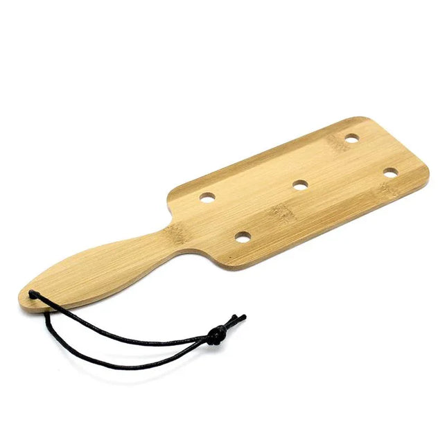 Paddle Bamboo - Ergonomic, lightweight bamboo paddle for BDSM play, 27.4 cm x 8.2 cm. Comfort and intensity for intimate moments.