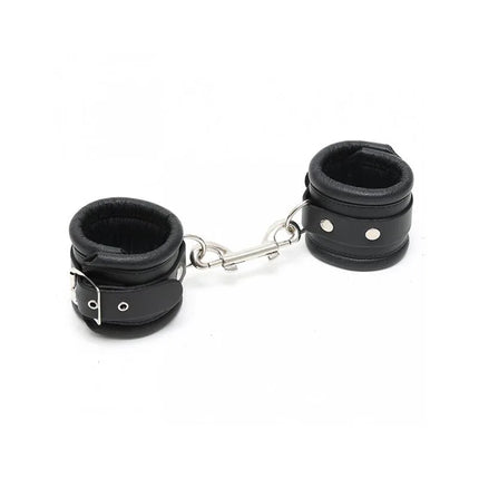 Feet Cuffs LUX 7 CM, premium black leather ankle cuffs with soft padding and adjustable metal buckle, ideal for BDSM restraint.