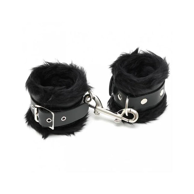 Hand Cuffs LUX 7 CM - Black leather cuffs with metal buckle, interior safety hook, and fur lining for secure and comfortable play.