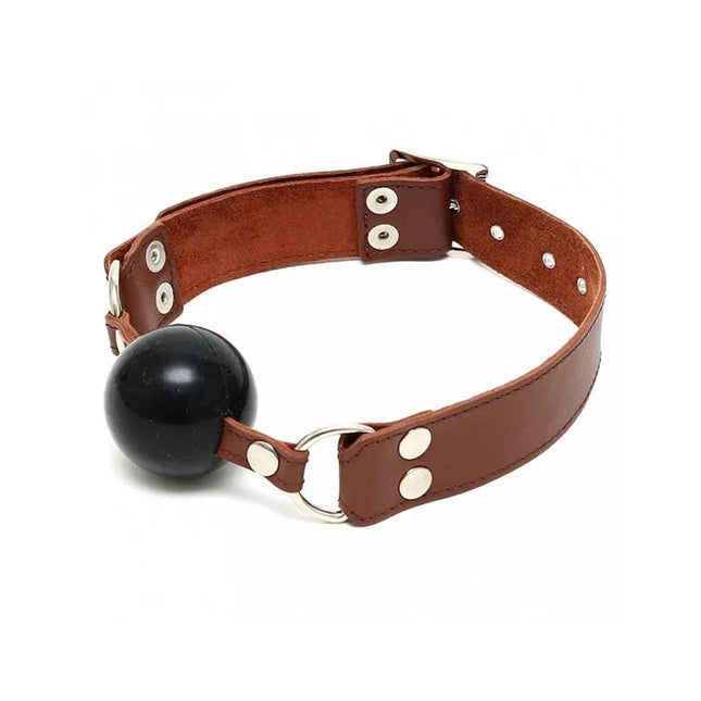 Brown leather adjustable Mouthgag for immersive BDSM play with black ball and secure fit.