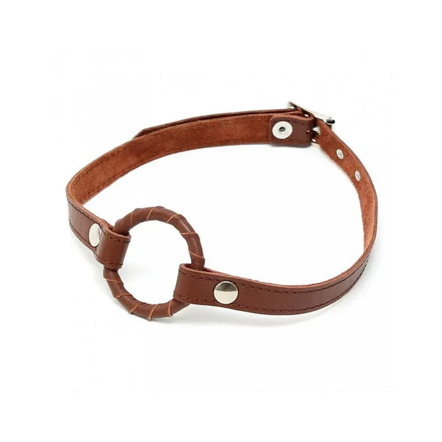 Mouthgag in brown leather with adjustable strap, designed for BDSM, featuring a leather-coated ring for secure fitting.