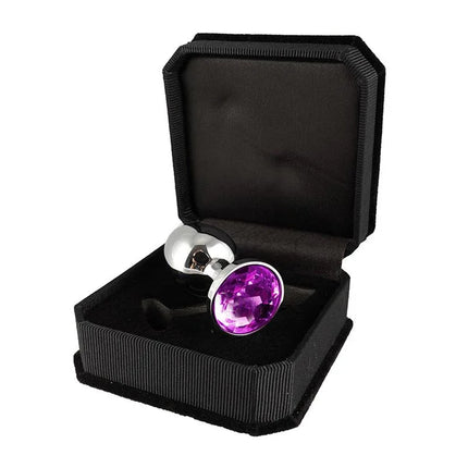 Plug Metal 7,3 cm luxury anal plug in black box, featuring surgical steel and purple glass accent, conical design for easy insertion.