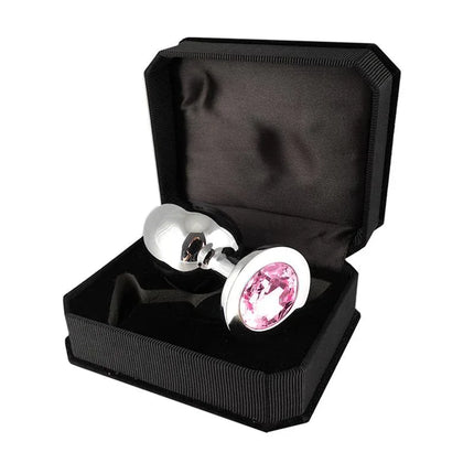 Rimba Bondage Play Plug Metal 9,7 cm in black case with pink glass accent