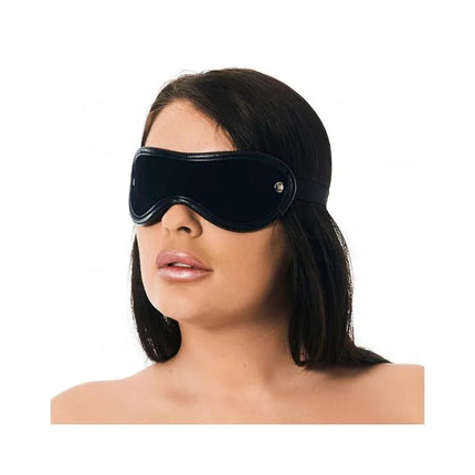 Woman wearing Black Leather Blindfold offering light-blocking and comfortable fit for sensory play and role-play.