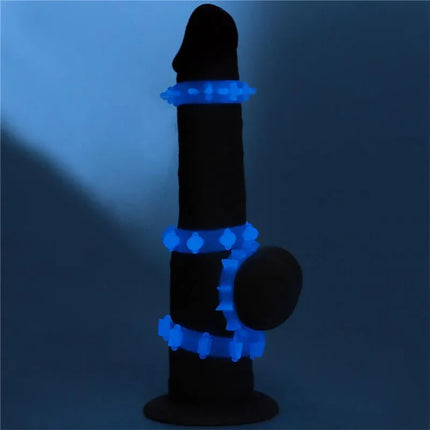 Glow-in-the-dark Lumino Play Set 4 Penis Ring Blue Light on display