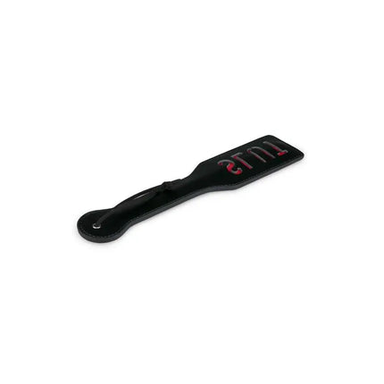 Black Leather Paddle - Slut with red lettering for intimate sessions, ergonomic handle for precise control.
